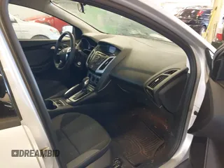 2013 Ford Focus SE z VIN 1FADP3F24DL277767, wystawiony jako IAAI lot #41562390 z przebiegiem 183 322 mil mil oraz . Historia ofert i sprzedaży dostępna na DreamBid. Obrazek 5.
