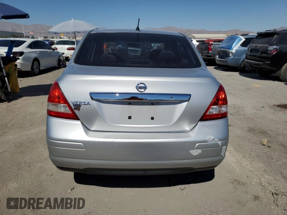 2011 Nissan Versa S with VIN 3N1BC1AP0BL410081, listed as a Copart auction lot 73737064 with 201,142 mi miles and Salvage title. Bid and sale history available at DreamBid. Image 6.