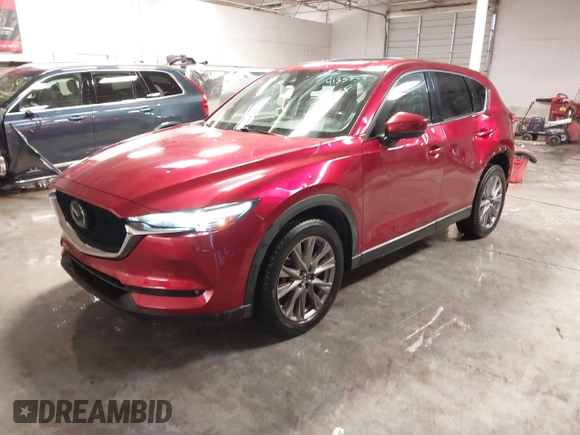 2020 Mazda CX-5 Grand Touring with VIN JM3KFBDM1L1809951, listed as a IAAI auction lot 41345854 with 117,376 mi miles. Bid and sale history available at carsss.com. Image 2.