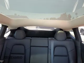 2022 Tesla Model Y Performance z VIN 7SAYGDEF2NF573979, wystawiony jako Copart lot #57778265 z przebiegiem 49 232 mil mil oraz Szkoda całkowita • Salvage title. Historia ofert i sprzedaży dostępna na DreamBid. Obrazek 10.
