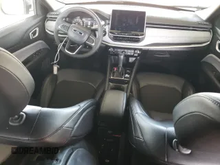 2023 Jeep Compass Latitude z VIN 3C4NJDBN0PT561850, wystawiony jako Copart lot #60563465 z przebiegiem 50 881 mil mil oraz Czysty tytuł • Clean title. Historia ofert i sprzedaży dostępna na DreamBid. Obrazek 8.