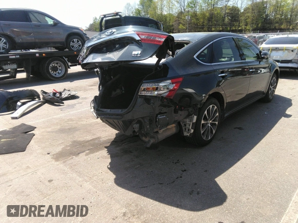 2018 Toyota Avalon Hybrid XLE Plus z VIN 4T1BD1EB1JU062378, wystawiony jako IAAI lot #41988148 z przebiegiem 128 220 mil mil oraz . Historia ofert i sprzedaży dostępna na DreamBid. Obrazek 4.