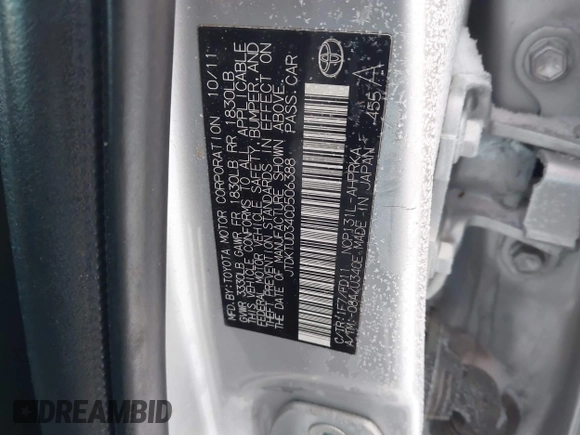 2012 Toyota Yaris L with VIN JTDKTUD34CD506388, listed as a IAAI auction lot 41014347 with 54,427 mi miles. Bid and sale history available at carsss.com. Image 9.