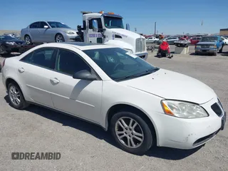 2005 Pontiac G6 z VIN 1G2ZG528954130107, wystawiony jako IAAI lot #42354301 z przebiegiem 176 157 mil mil oraz . Historia ofert i sprzedaży dostępna na DreamBid. Obrazek 1.