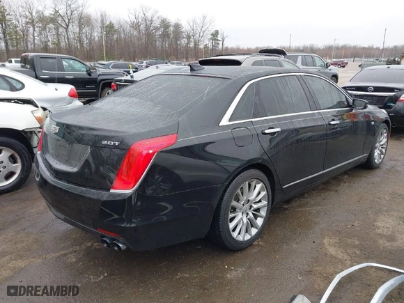 2016 Cadillac CT6 RWD with VIN 1G6KA5RX4GU163954, listed as a IAAI auction lot 41757869 with 107,137 mi miles. Bid and sale history available at carsss.com. Image 4.