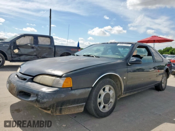 1995 Ford Thunderbird LX z VIN 1FALP62W7SH175725, wystawiony jako Copart lot #60622085 z przebiegiem 77 454 mil mil oraz Czysty tytuł • Clean title. Historia ofert i sprzedaży dostępna na DreamBid. Obrazek 1.