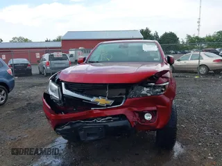 2017 Chevrolet Colorado 4WD LT z VIN 1GCGTCEN5H1227895, wystawiony jako IAAI lot #42384312 z przebiegiem 121 910 mil mil oraz . Historia ofert i sprzedaży dostępna na DreamBid. Obrazek 12.