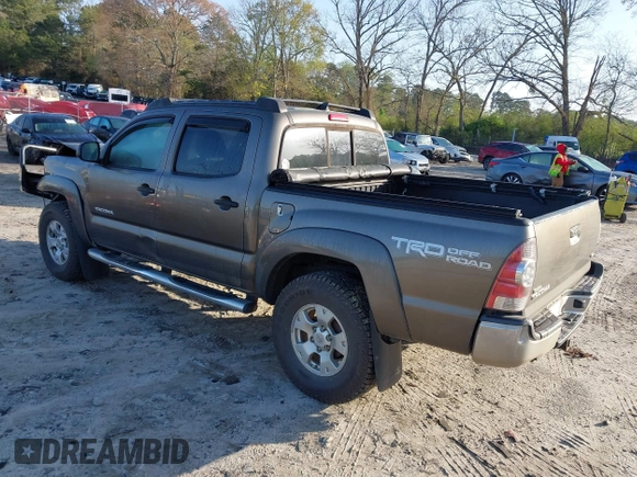 2014 Toyota Tacoma with VIN 3TMLU4EN3EM163162, listed as a IAAI auction lot 41930392 with 167,368 mi miles and . Bid and sale history available at DreamBid. Image 3.