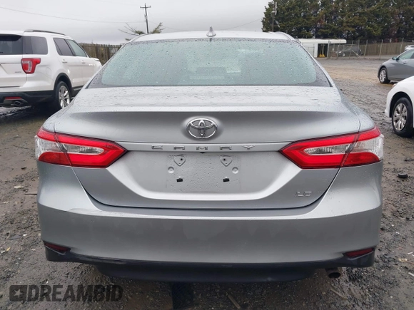 2020 Toyota Camry LE with VIN 4T1C11AK5LU869525, listed as a IAAI auction lot 41693706 with 134,201 mi miles. Bid and sale history available at carsss.com. Image 16.