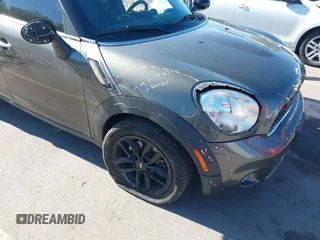 2014 MINI Countryman S z VIN WMWZC3C59EWP29686, wystawiony jako IAAI lot #42292047 z przebiegiem 93 139 mil mil oraz . Historia ofert i sprzedaży dostępna na DreamBid. Obrazek 6.
