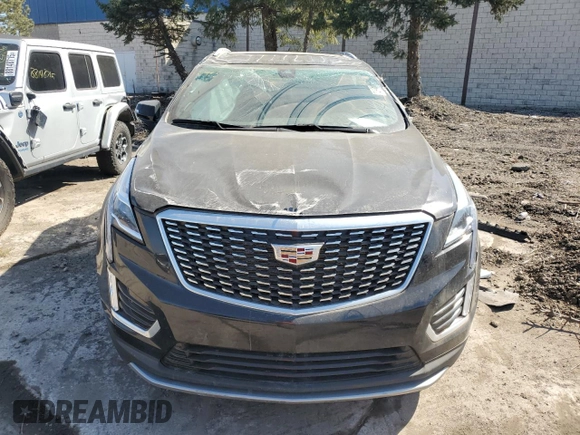 2022 Cadillac XT5 AWD Premium Luxury with VIN 1GYKNDRS7NZ164512, listed as a Copart auction lot 49236945 with 30,019 mi miles and Salvage title. Bid and sale history available at DreamBid. Image 5.