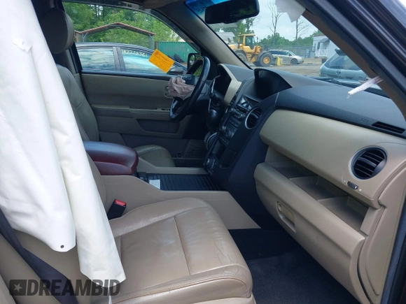 2012 Honda Pilot EX-L z VIN 5FNYF4H79CB026760, wystawiony jako IAAI lot #42277545 z przebiegiem 154 148 mil mil oraz . Historia ofert i sprzedaży dostępna na DreamBid. Obrazek 5.