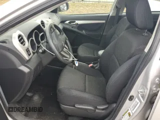 2009 Pontiac Vibe w/1SA with VIN 5Y2SP67859Z463621, listed as a Copart auction lot 77535724 with 61,888 mi miles and Salvage Title. Bid and sale history available at carsss.com. Image 7.