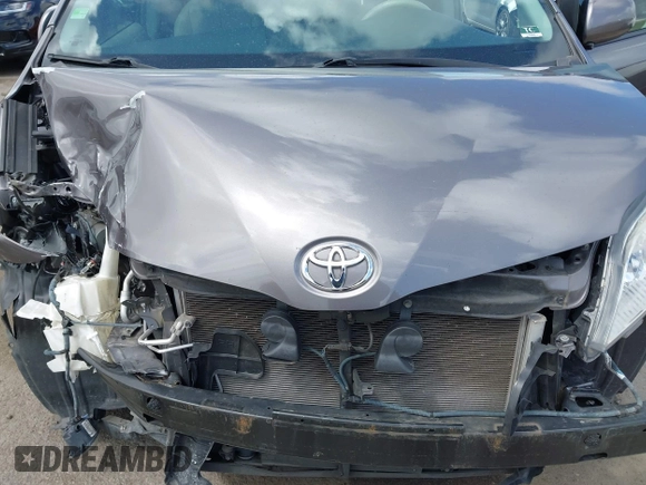 2014 Toyota Sienna XLE with VIN 5TDYK3DC7ES517206, listed as a IAAI auction lot 41945572 with 128,743 mi miles and . Bid and sale history available at DreamBid. Image 10.