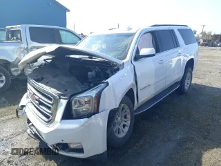 2019 GMC Yukon XL SLT with VIN 1GKS2GKC1KR279755, listed as a Copart auction lot 64695394 with 0 mi miles and Salvage Title. Bid and sale history available at carsss.com. Image 1.