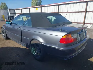 2001 BMW 3 Series 325Ci with VIN WBABS33481JY57131, listed as a IAAI auction lot 42111266 with 97,924 mi miles. Bid and sale history available at carsss.com. Image 3.