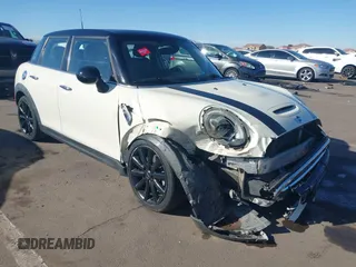 2017 MINI Hardtop 4 Door Cooper S z VIN WMWXU3C37H2F48457, wystawiony jako IAAI lot #41684263 z przebiegiem 120 699 mil mil oraz . Historia ofert i sprzedaży dostępna na DreamBid. Obrazek 1.