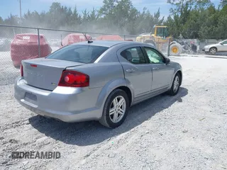 2013 Dodge Avenger SXT with VIN 1C3CDZCGXDN741008, listed as a IAAI auction lot 42086508 with 124,596 mi miles and . Bid and sale history available at carsss.com. Image 4.