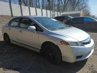 2010 Honda Civic Sdn EX with VIN 19XFA1F84AE035594, listed as a IAAI auction lot 41752445 with 173,264 mi miles. Bid and sale history available at carsss.com. Image 1.