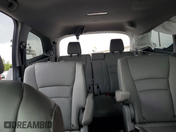 2022 Honda Pilot Touring 7-Passenger with VIN 5FNYF6H69NB019572, listed as a Copart auction lot 55446895 with 82,424 mi miles and Salvage title. Bid and sale history available at DreamBid. Image 10.