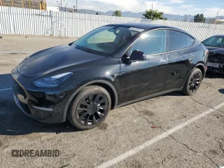 2024 Tesla Model Y Long Range with VIN 7SAYGAEE2RF075681, listed as a Copart auction lot 86433524 with 18,640 mi miles and Salvage title. Bid and sale history available at DreamBid. Image 1.