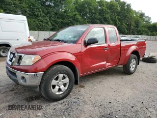 2010 Nissan Frontier SE with VIN 1N6AD0CW1AC409386, listed as a Copart auction lot 65464965 with 112,818 mi miles and Salvage title. Bid and sale history available at DreamBid. Image 1.