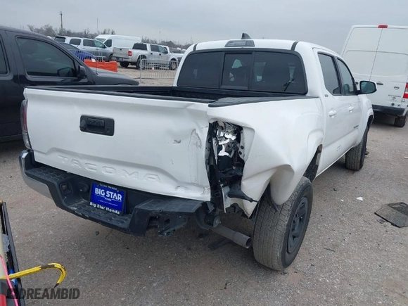 2023 Toyota Tacoma 2WD SR with VIN 3TYAX5GN0PT068597, listed as a IAAI auction lot 41603109 with 33,279 mi miles. Bid and sale history available at carsss.com. Image 4.