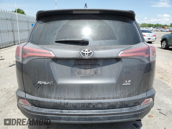 2018 Toyota RAV4 LE with VIN JTMBFREV1JJ746565, listed as a Copart auction lot 58141295 with 93,379 mi miles and Clean title. Bid and sale history available at DreamBid. Image 6.