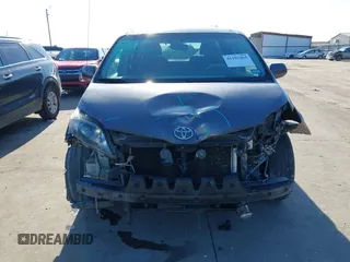 2014 Toyota Sienna SE with VIN 5TDXK3DC7ES482954, listed as a IAAI auction lot 41197465 with 160,107 mi miles and . Bid and sale history available at DreamBid. Image 13.