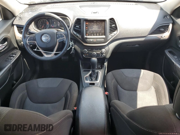 2016 Jeep Cherokee Altitude with VIN 1C4PJLCB8GW207480, listed as a Copart auction lot 62026585 with 124,229 mi miles and Salvage title. Bid and sale history available at DreamBid. Image 8.