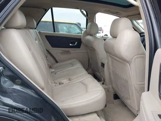 2004 Cadillac SRX with VIN 1GYDE63A540153774, listed as a IAAI auction lot 41500070 with 144,718 mi miles. Bid and sale history available at carsss.com. Image 8.
