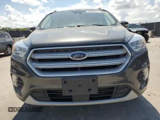2019 Ford Escape Titanium z VIN 1FMCU9J96KUA65154, wystawiony jako Copart lot #63932325 z przebiegiem 117 963 mil mil oraz Czysty tytuł • Clean title. Historia ofert i sprzedaży dostępna na DreamBid. Obrazek 5.