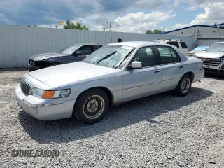 2000 Mercury Grand Marquis LS z VIN 2MEFM75W8YX614309, wystawiony jako Copart lot #61229915 z przebiegiem 228 527 mil mil oraz Szkoda całkowita • Salvage title. Historia ofert i sprzedaży dostępna na DreamBid. Obrazek 1.