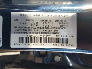 2021 Mazda 3 Select with VIN JM1BPABL7M1314973, listed as a IAAI auction lot 42011342 with 53,785 mi miles and . Bid and sale history available at DreamBid. Image 9.