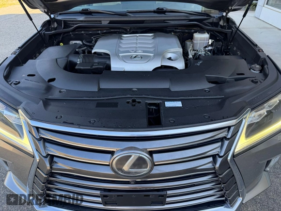 2016 Lexus LX 570 with VIN JTJHY7AX4G4198811, listed as a Copart auction lot 64898475 with 107,759 mi miles and Clean title. Bid and sale history available at DreamBid. Image 7.