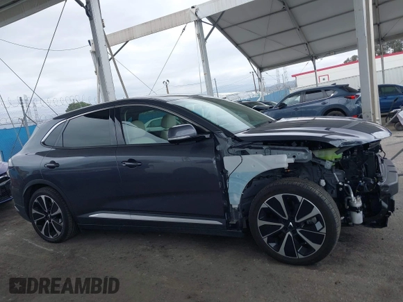 2023 VinFast VF 8 Plus z VIN RLLV1AFA9PH001464, wystawiony jako IAAI lot #41798776 z przebiegiem 2355 mil mil oraz . Historia ofert i sprzedaży dostępna na DreamBid. Obrazek 14.