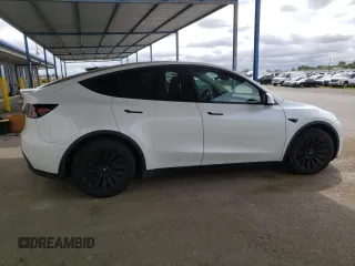 2022 Tesla Model Y Long Range with VIN 7SAYGAEE9NF384400, listed as a Copart auction lot 51961545 with 31,758 mi miles and Salvage Title. Bid and sale history available at DreamBid. Image 3.