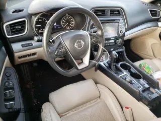 2017 Nissan Maxima SR z VIN 1N4AA6AP7HC400167, wystawiony jako Copart lot #51002585 z przebiegiem 86 170 mil mil oraz Nie do naprawy • Non repairable. Historia ofert i sprzedaży dostępna na DreamBid. Obrazek 8.