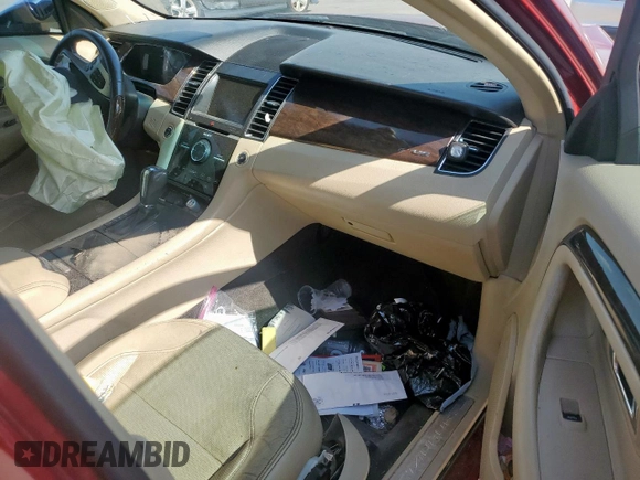 2014 Ford Taurus Limited with VIN 1FAHP2F89EG186567, listed as a Copart auction lot 61404285 with 188,890 mi miles and Salvage title. Bid and sale history available at DreamBid. Image 8.