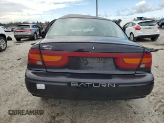 2000 Saturn SL with VIN 1G8ZK5274YZ145472, listed as a Copart auction lot 42871945 with Not provided miles and Salvage title. Bid and sale history available at DreamBid. Image 6.