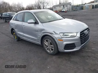 2017 Audi Q3 Premium with VIN WA1ECCFS1HR014286, listed as a IAAI auction lot 41582743 with 105,585 mi miles. Bid and sale history available at carsss.com. Image 1.