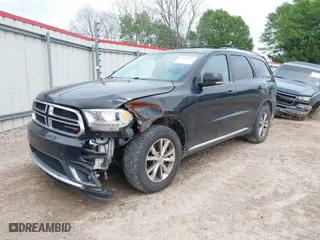 2014 Dodge Durango Limited with VIN 1C4RDHDG4EC595975, listed as a IAAI auction lot 41920553 with 242,949 mi miles. Bid and sale history available at carsss.com. Image 1.