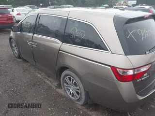 2011 Honda Odyssey EX-L with VIN 5FNRL5H68BB054204, listed as a IAAI auction lot 42576248 with Not provided miles and . Bid and sale history available at DreamBid. Image 3.