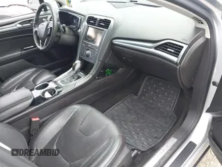 2014 Ford Fusion Titanium with VIN 3FA6P0K95ER151625, listed as a IAAI auction lot 42109141 with 182,328 mi miles and . Bid and sale history available at DreamBid. Image 5.