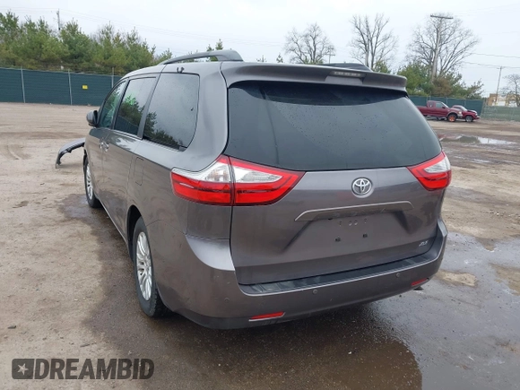 2015 Toyota Sienna XLE with VIN 5TDYK3DC8FS651580, listed as a IAAI auction lot 41971867 with 49,711 mi miles. Bid and sale history available at carsss.com. Image 3.