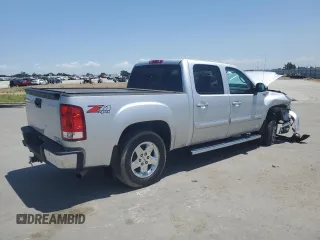 2013 GMC Sierra 1500 SLT with VIN 3GTP2WE71DG157541, listed as a Copart auction lot 62363665 with 56,143 mi miles and Salvage title. Bid and sale history available at DreamBid. Image 3.