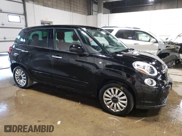 2014 FIAT 500L Easy with VIN ZFBCFABH9EZ000959, listed as a Copart auction lot 76991304 with 73,128 mi miles and Salvage Title. Bid and sale history available at carsss.com. Image 4.