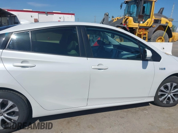 2021 Toyota Prius LE with VIN JTDKAMFP2M3177459, listed as a IAAI auction lot 42093828 with 65,501 mi miles and . Bid and sale history available at DreamBid. Image 13.