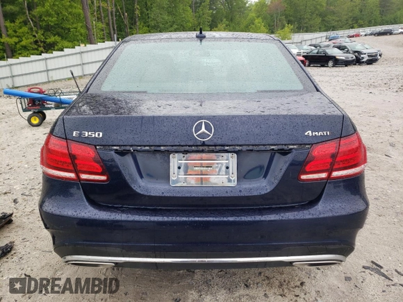 2014 Mercedes-Benz E 350 Luxury with VIN WDDHF8JB4EB041300, listed as a Copart auction lot 57024765 with 124,673 mi miles and Clean title. Bid and sale history available at DreamBid. Image 6.