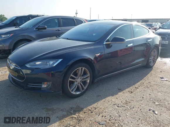 2014 Tesla Model S 60 with VIN 5YJSA1H12EFP39873, listed as a IAAI auction lot 42443414 with 132,773 mi miles and . Bid and sale history available at DreamBid. Image 2.